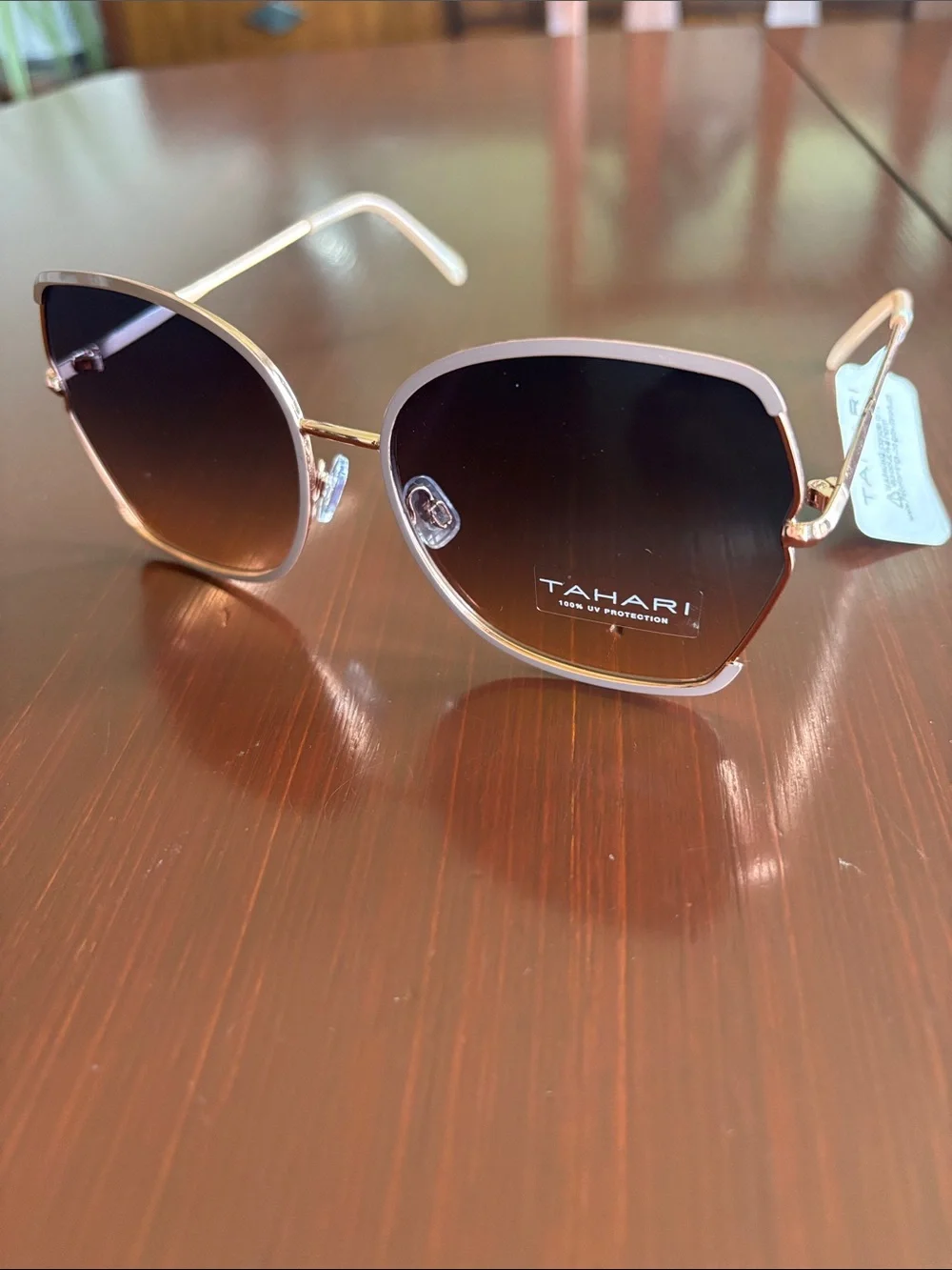 Tahari 100% UV protect,rose gold metal frame/arms,gradient brown lens